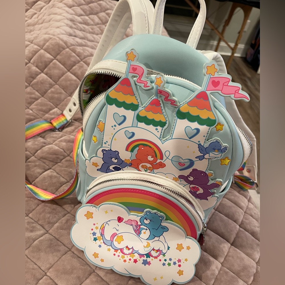 Excellent Used Condition Care Bears Loungefly Backpack.